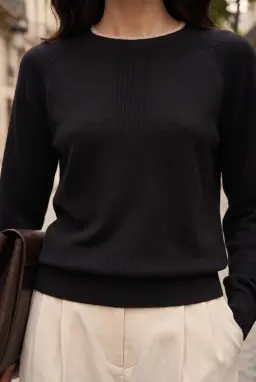Top de malha preto de manga longa para mulher com debrum em contraste